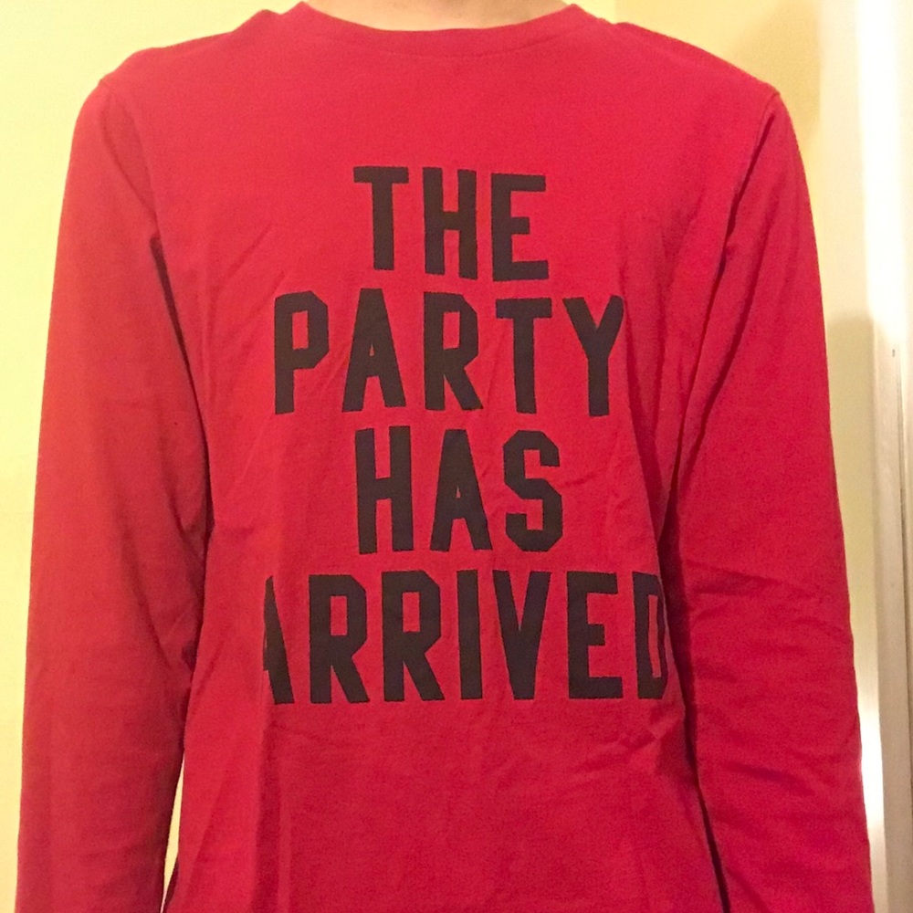 Red long sleeve, black block words